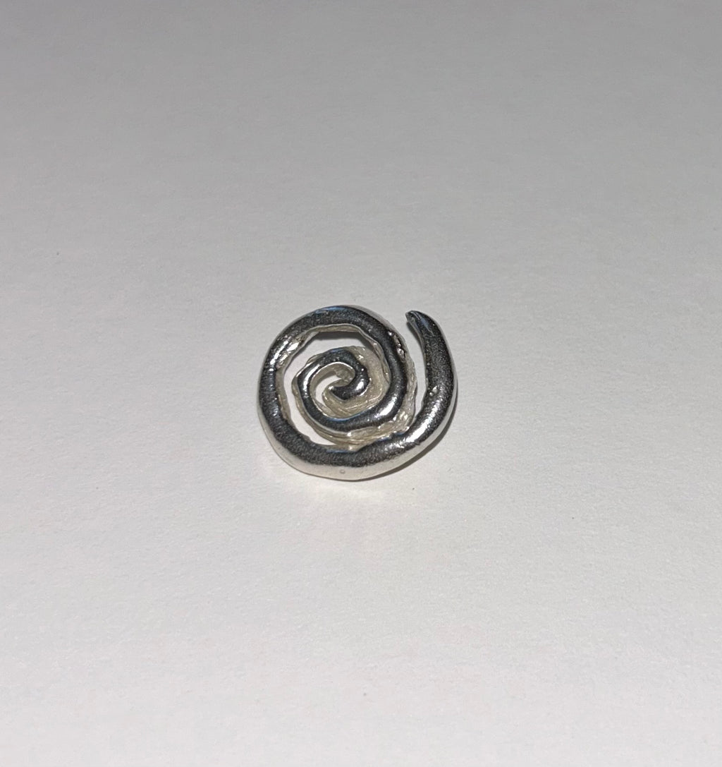 The Spiral Button
